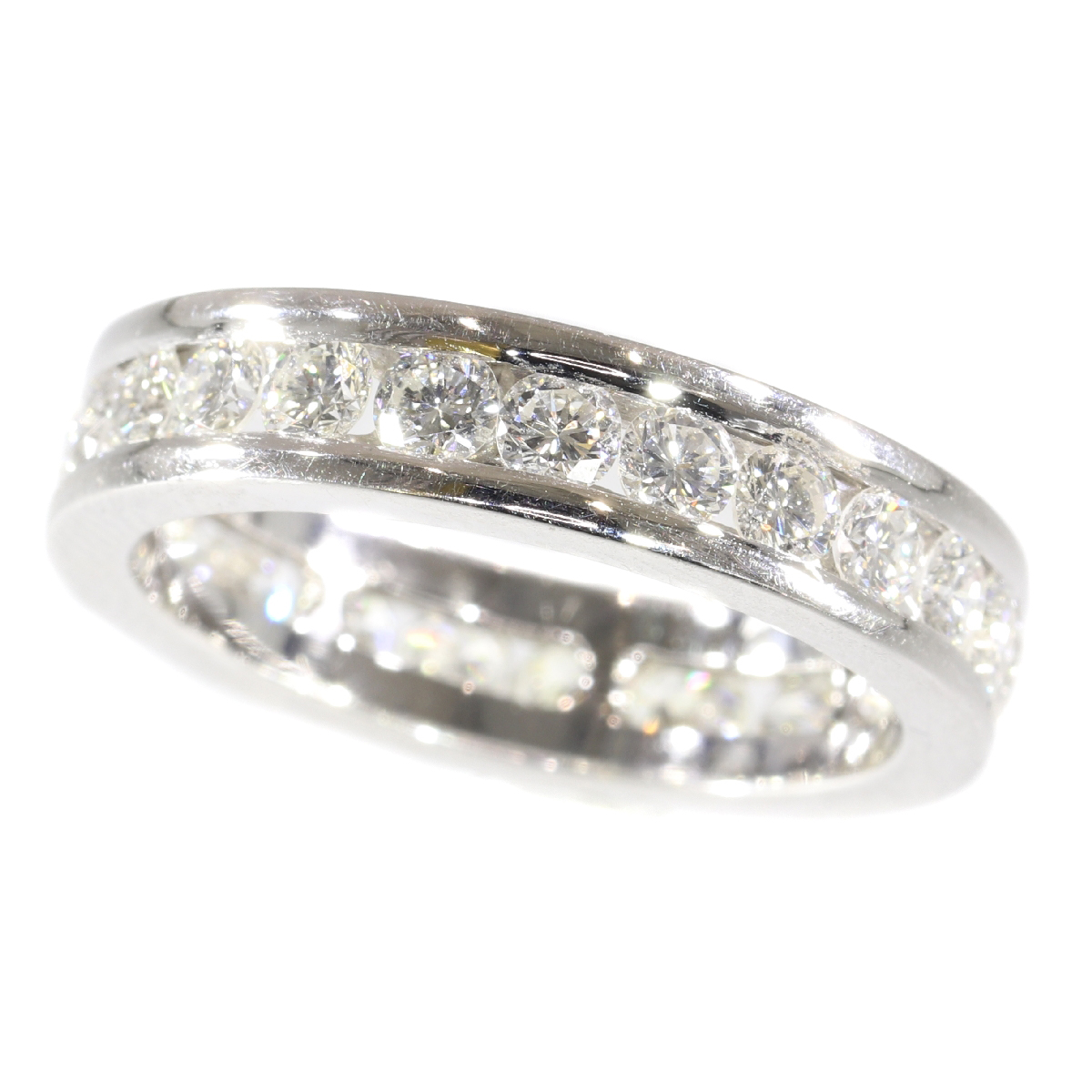 White gold estate eternity band or a so-called alliance ring set with brilliants